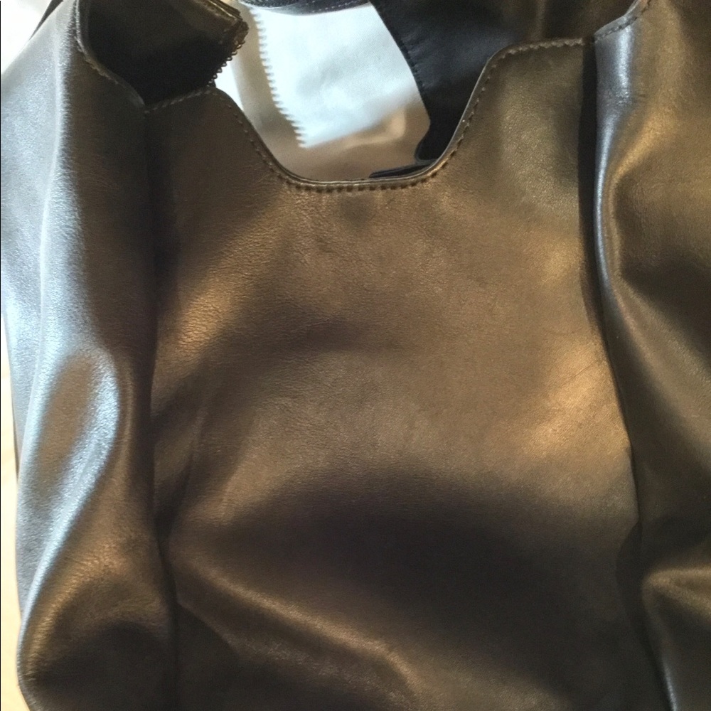 Aritzia’s Six Eleven black leather McDuffle - Picture 14 of 14